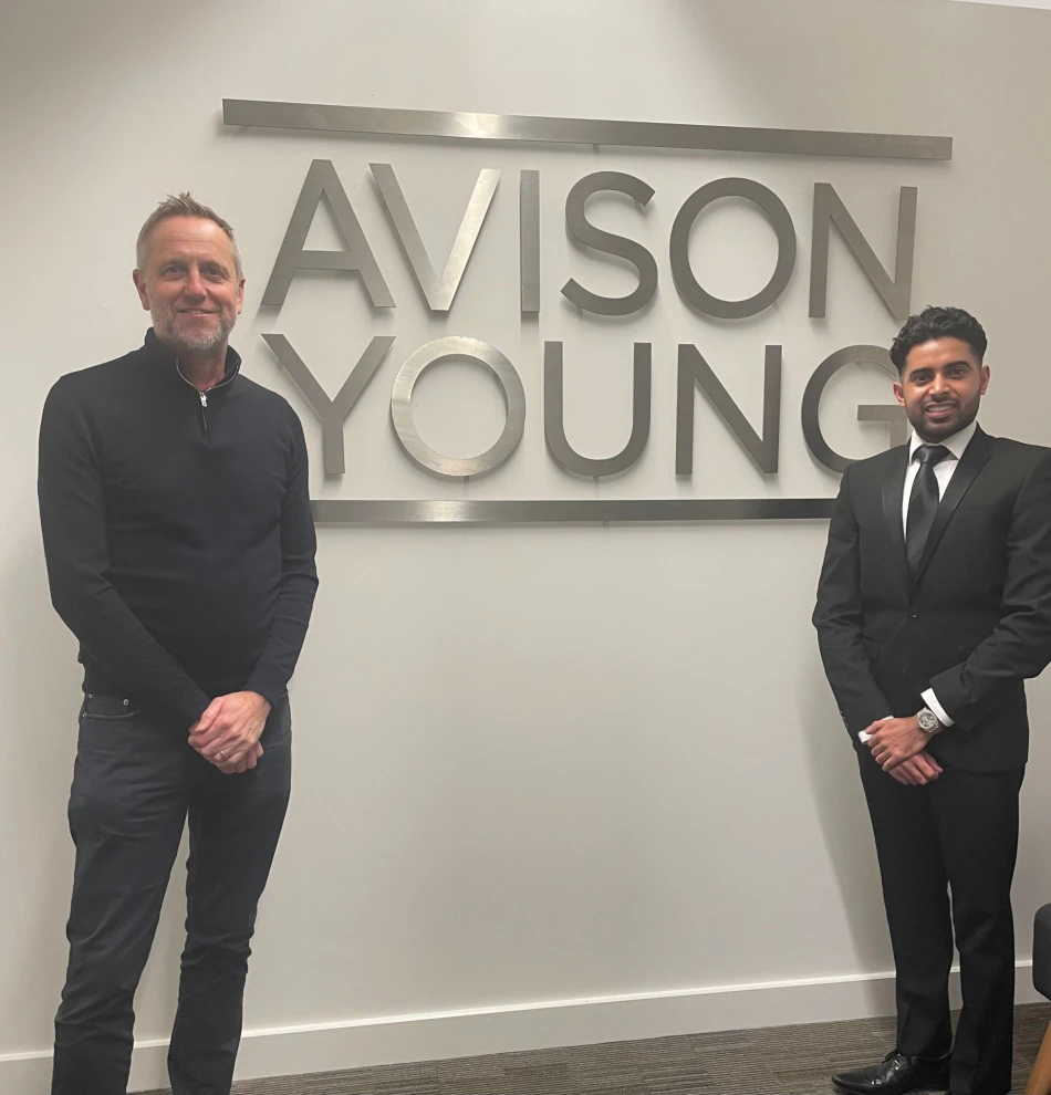 Gordon Hewling welcoming Kashaf Ali to Avison Young